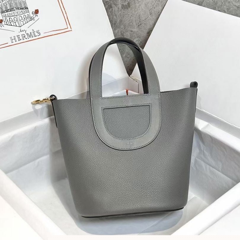 H**mes shopping bags